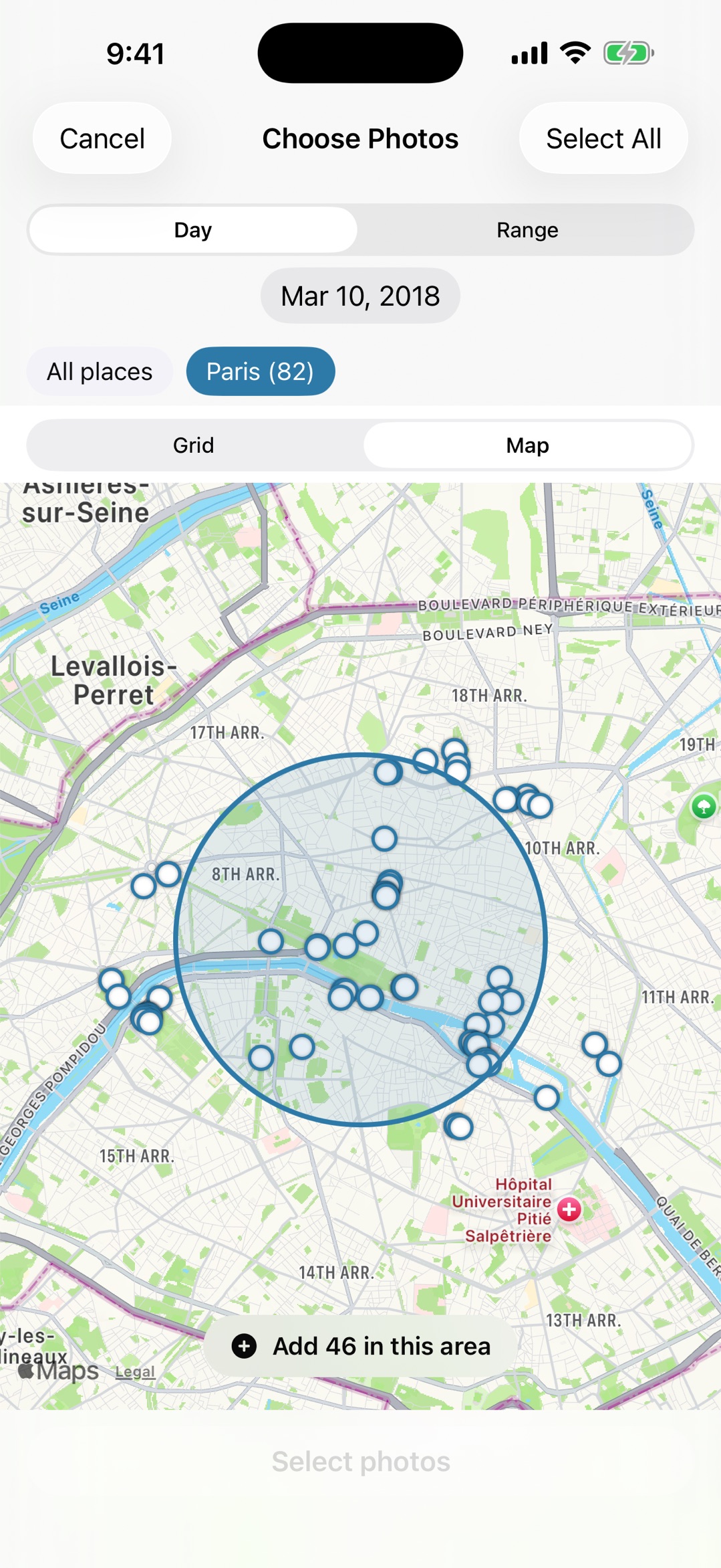 Wander's photo picker in map mode, a selection circle drawn over a cluster of photos taken across central Paris
